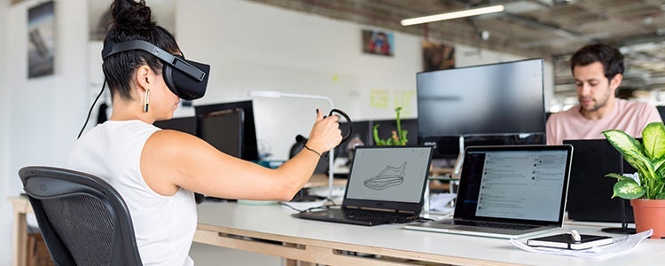 Arts student with a virtual reality headset on