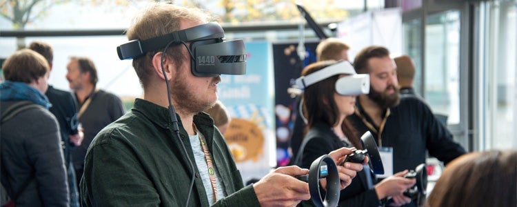 Group using VR goggles.