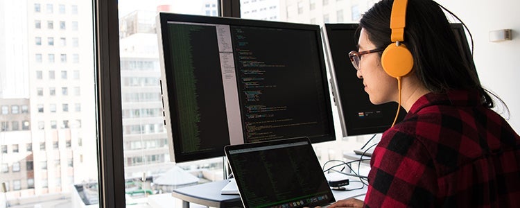 Student working at a monitor