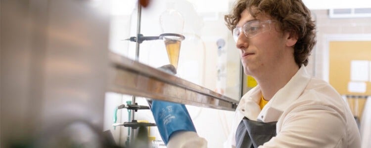 Carson working in the geology lab.