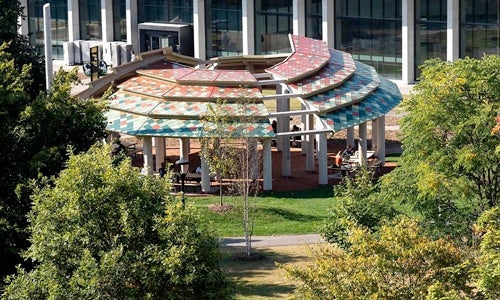 Waterloo's Indigenous Gathering Centre set among trees in the heart of campus