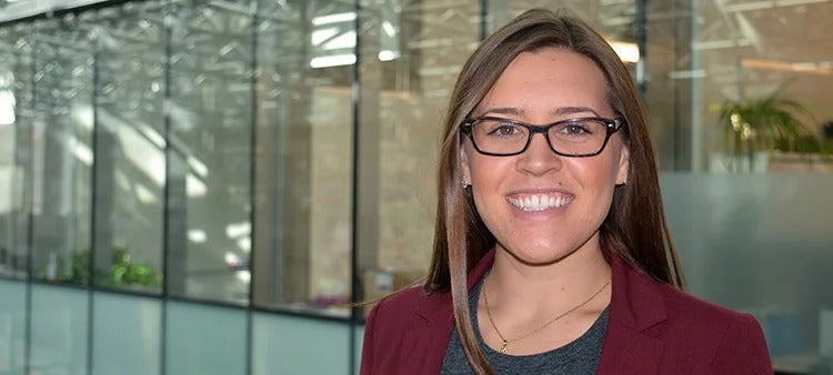 female student smiling at camera