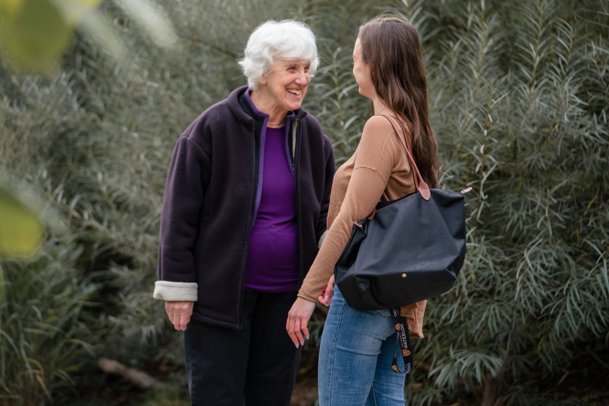 Katie and her grandma outside.