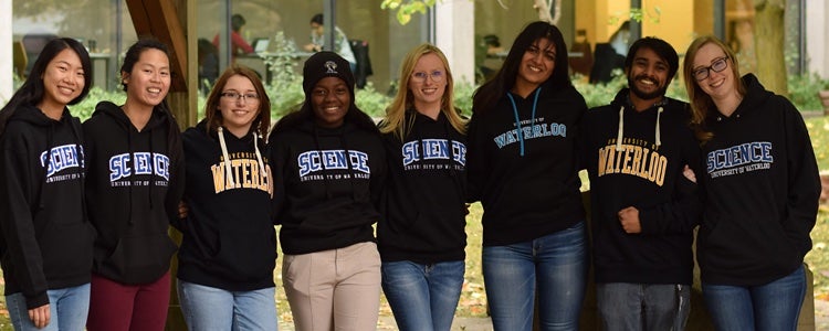 Students wearing faculty of science hoodies