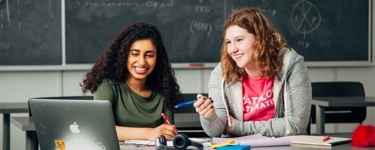 2 math students studying together.