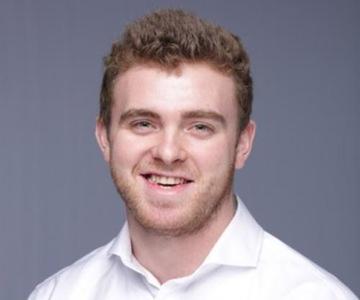 Headshot of health and safety associate Matt Girodat