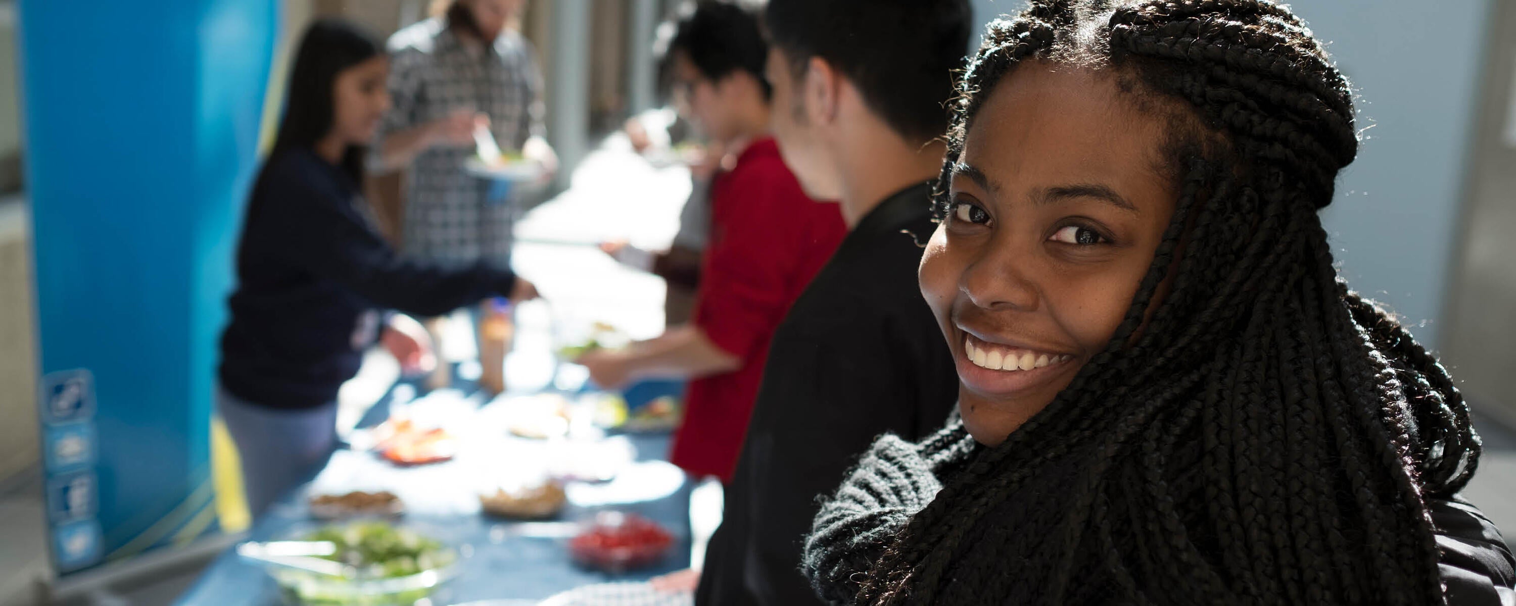 Student getting free food at Science Society event