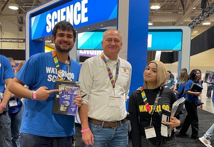 Waterloo professor and students at the Ontario Universities Fair