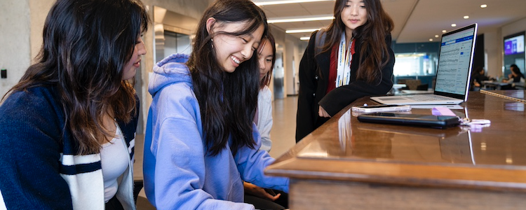 Group of friends playing the piano in E7. 