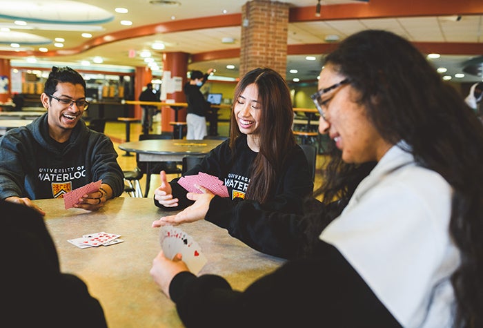 Students playing cards in residence