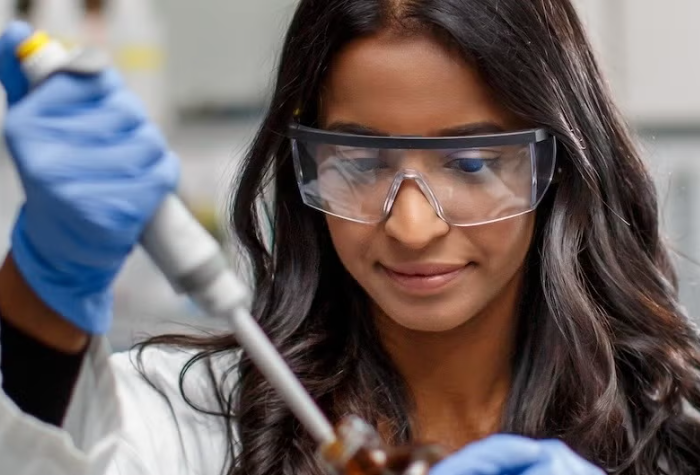 Student experimenting in a lab