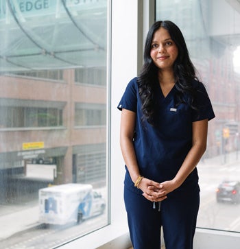 Rithvika next to the window