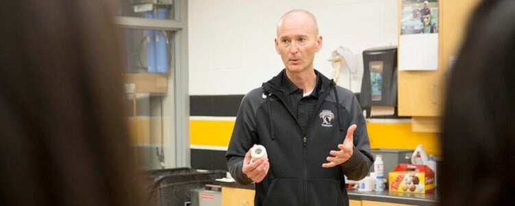 Rob Burns, clinical instructor in the Department of Kinesiology, talking to students in class.