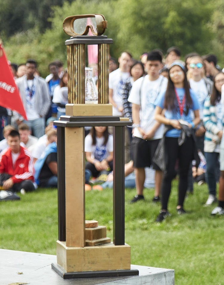 Golden trophy on edge of stage