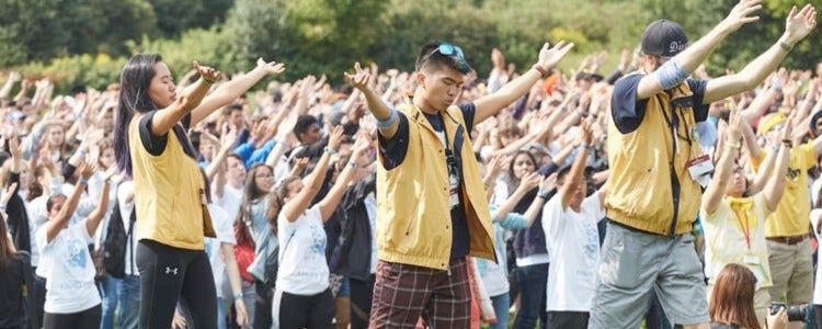 Science students dancing outside