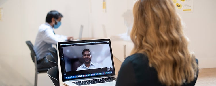 Student talking to someone on a video call.