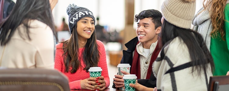 A group of students having coffee together