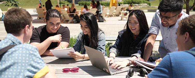 Waterloo students hanging out in Arts Quad