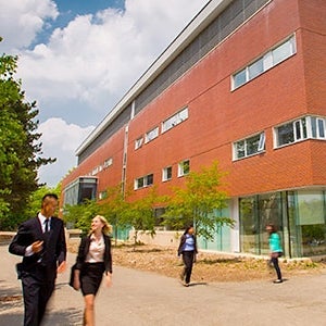 Students walking by Waterloo's co-op building