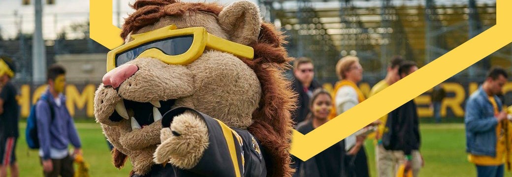 Waterloo lion mascot, King Warrior, pointing at the camera