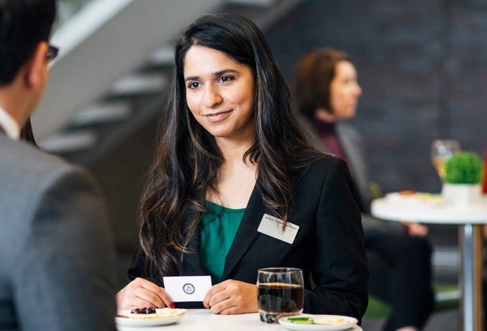 Simran at a networking event.