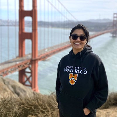 Student standing in front of Golden Gate bridge in San Francisco