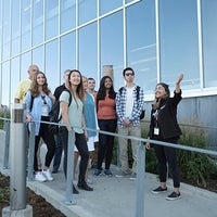 An ambassador guides students on a tour