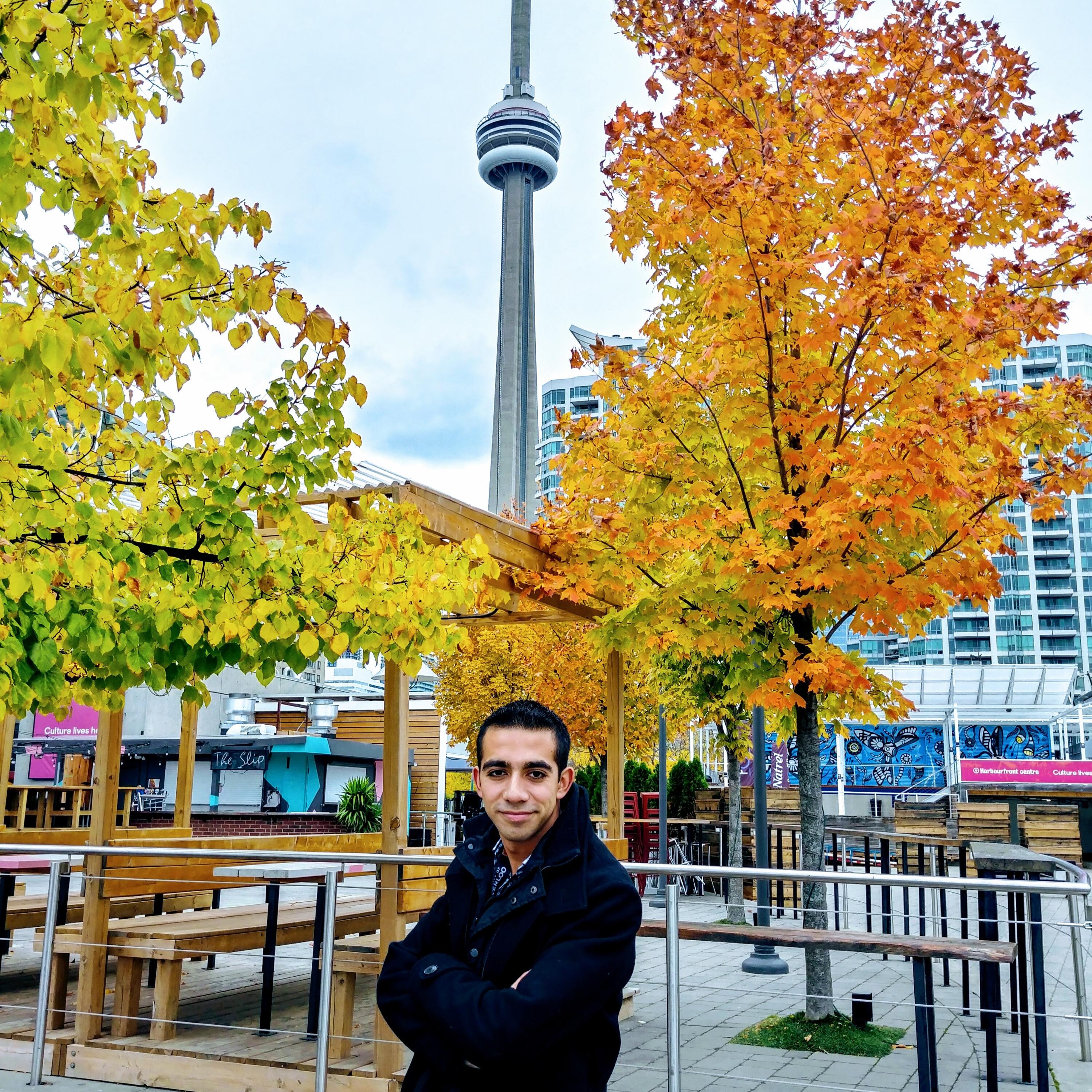 Marco standing in front of the CN tower