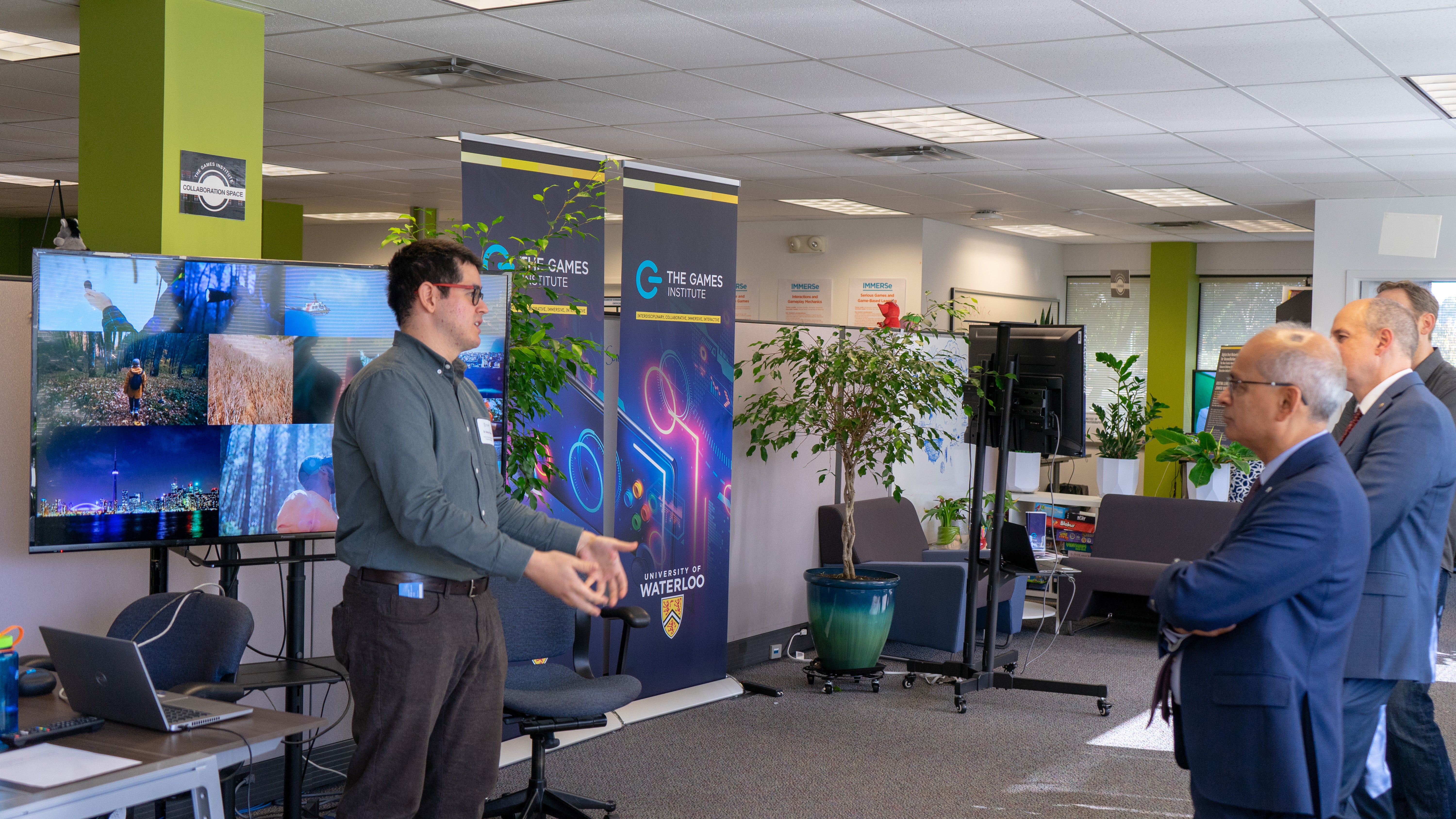 Hector Perez presenting his research to UWaterloo president