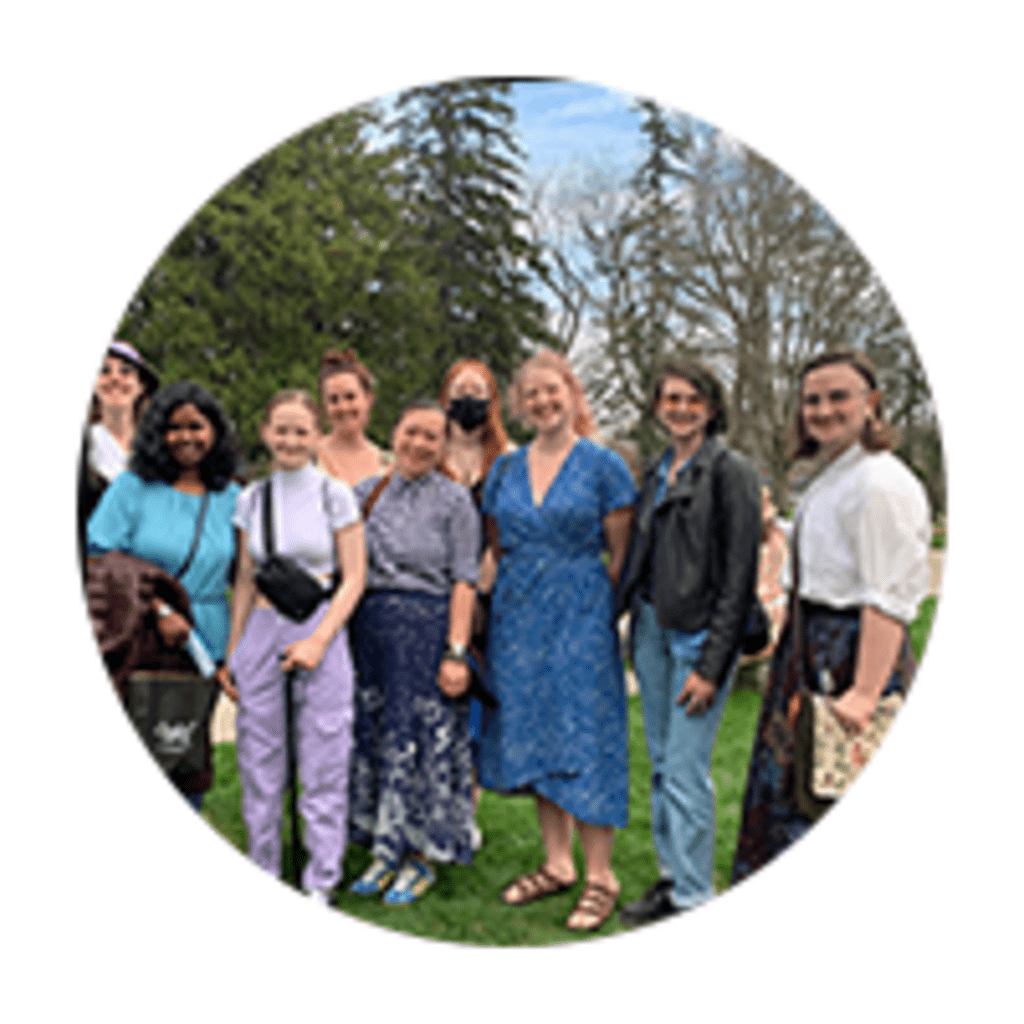 a group of students and prof's outside of the festival theatre