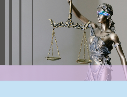 a bronze statue of 'lady justice' holding the scales of justice. Her blind fold is patterned with various gender symbols, there are grey bars to the left of her and pink and blue rectangles under the image