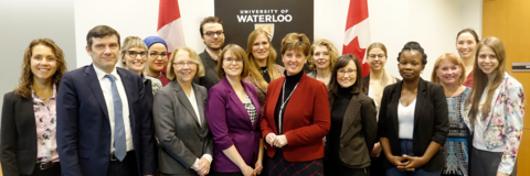 Key participants of the Roundtable discussion pose for a photo with the Hon. Marie Claude Bibeau