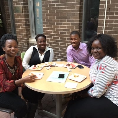 GoHelP lab members enjoying food at the CAGONT Grad Student Reception