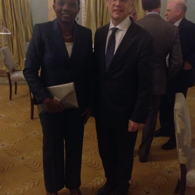 Elizabeth Opyio standing next to Canadian High Commissioner to Kenya David Angell