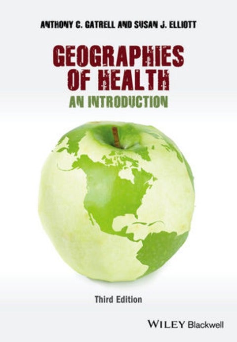 Cover of textbook: Apple with picture of the world on it. 
