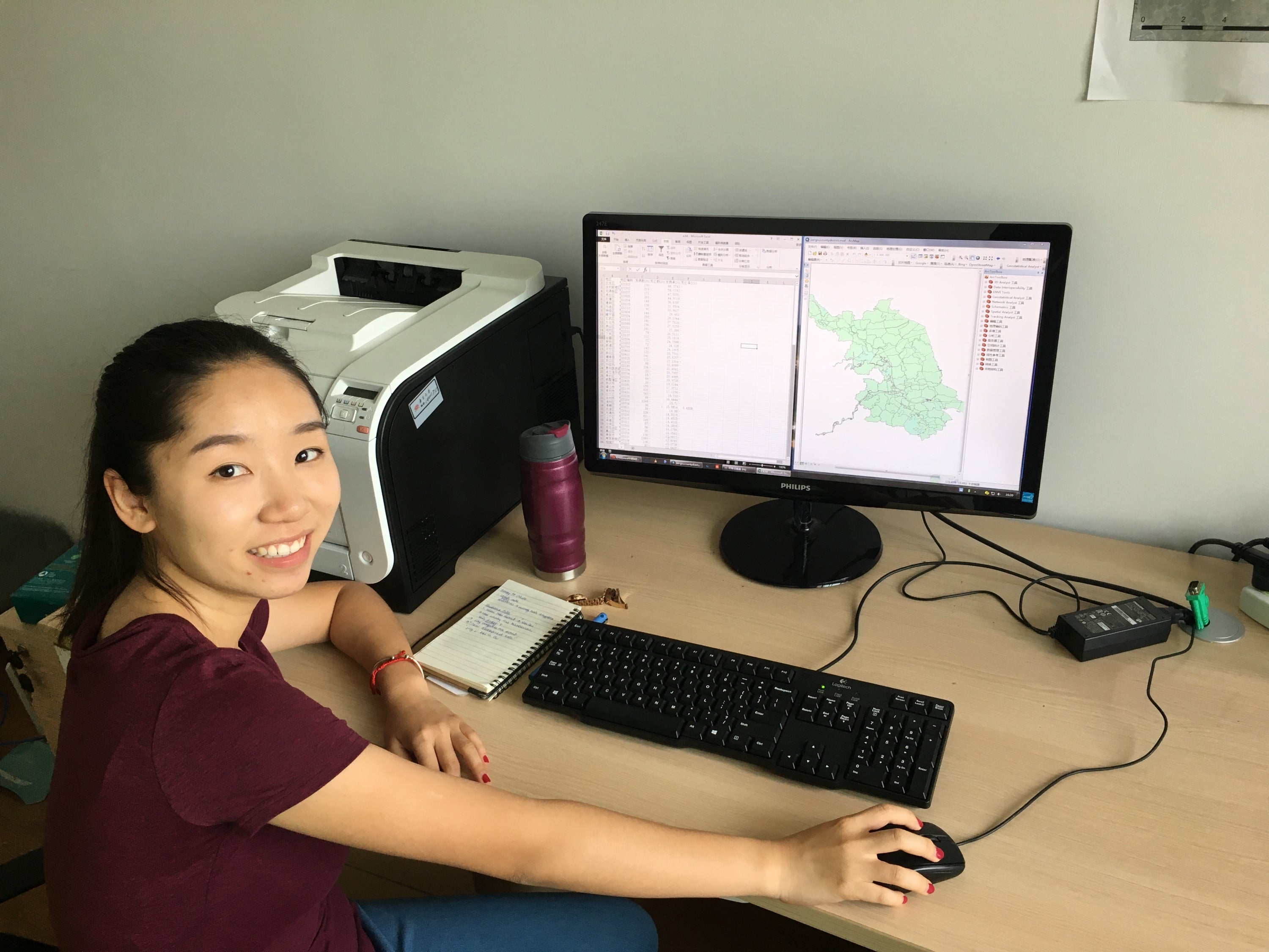 Sabrina Li analyzing data in GIS lab