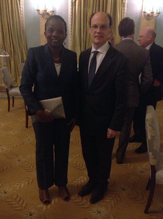 Elizabeth Opyio standing next to Canadian High Commissioner to Kenya David Angell