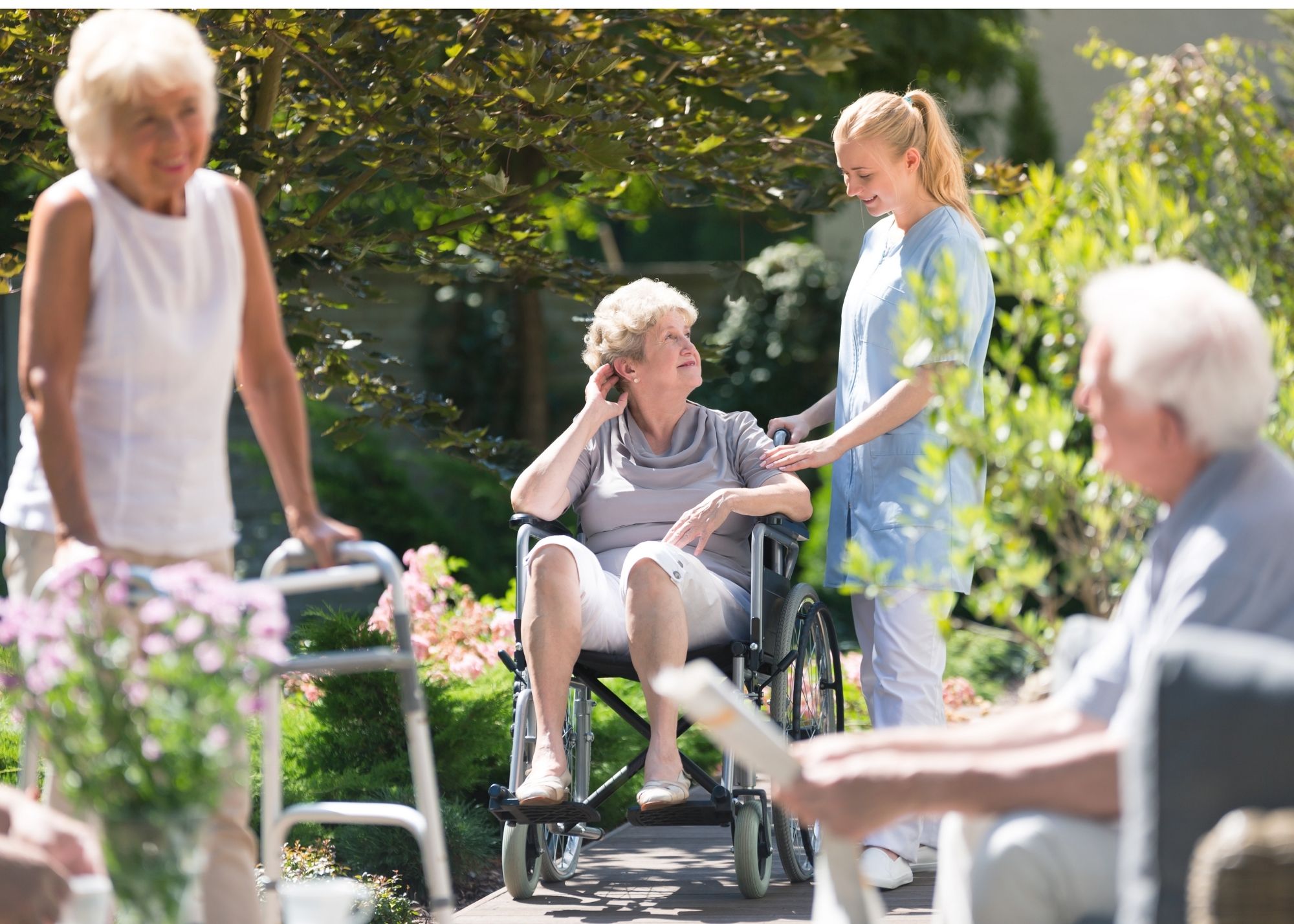 woman in wheelchair with her caregiver
