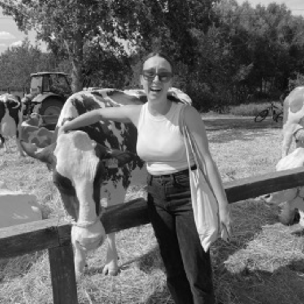 Helena Ortlieb petting a cow