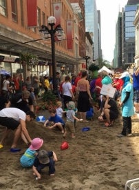 Children participating in the world's largest sandbox