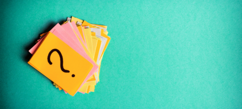 Question mark on a post it note