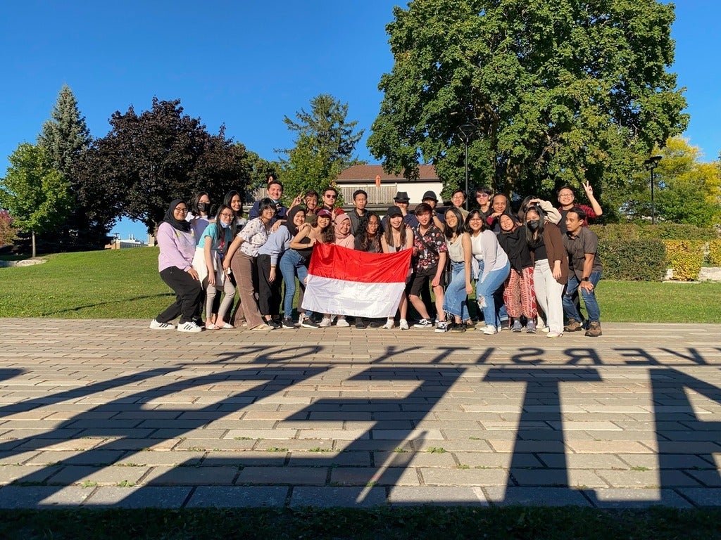 Indonesian students holding flag