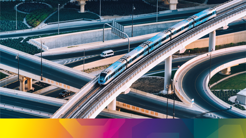 A complex criss-cross of roads and train tracks