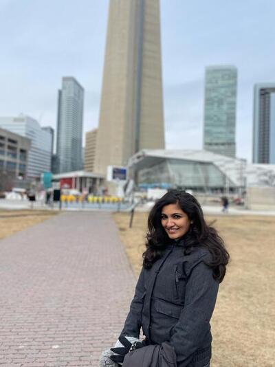 Navya standing in front of the CN tower