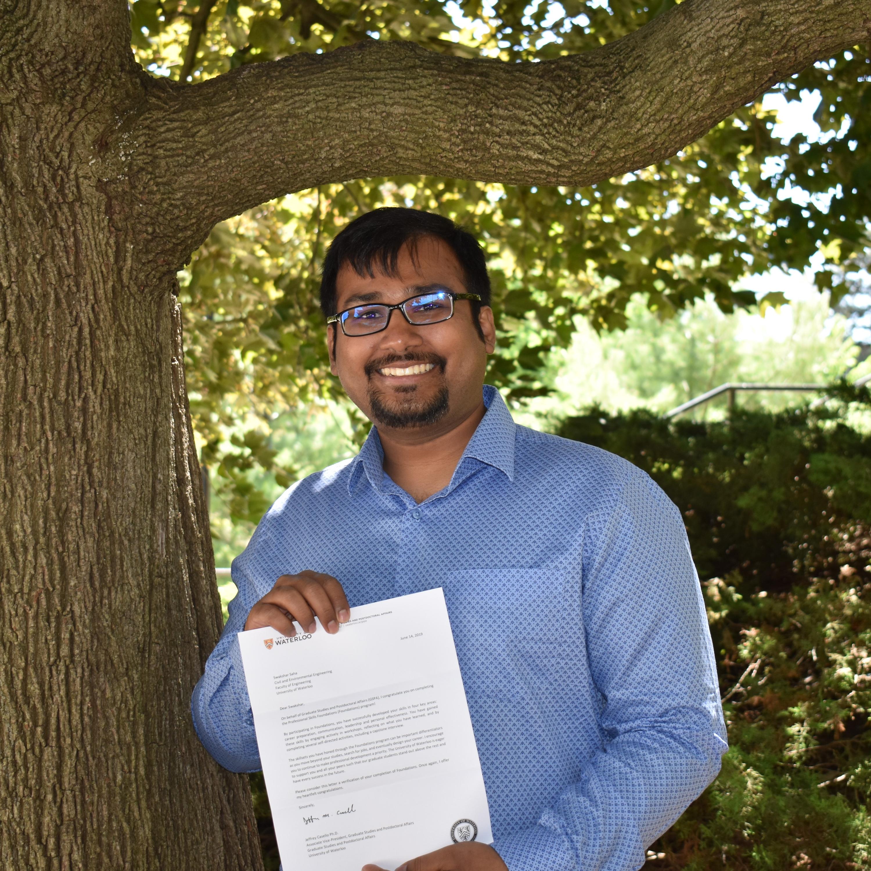 Swakshar Saha shows off his Foundations completion letter