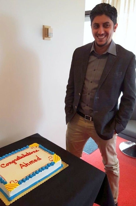 Photo of Ahmed with his defense cake 