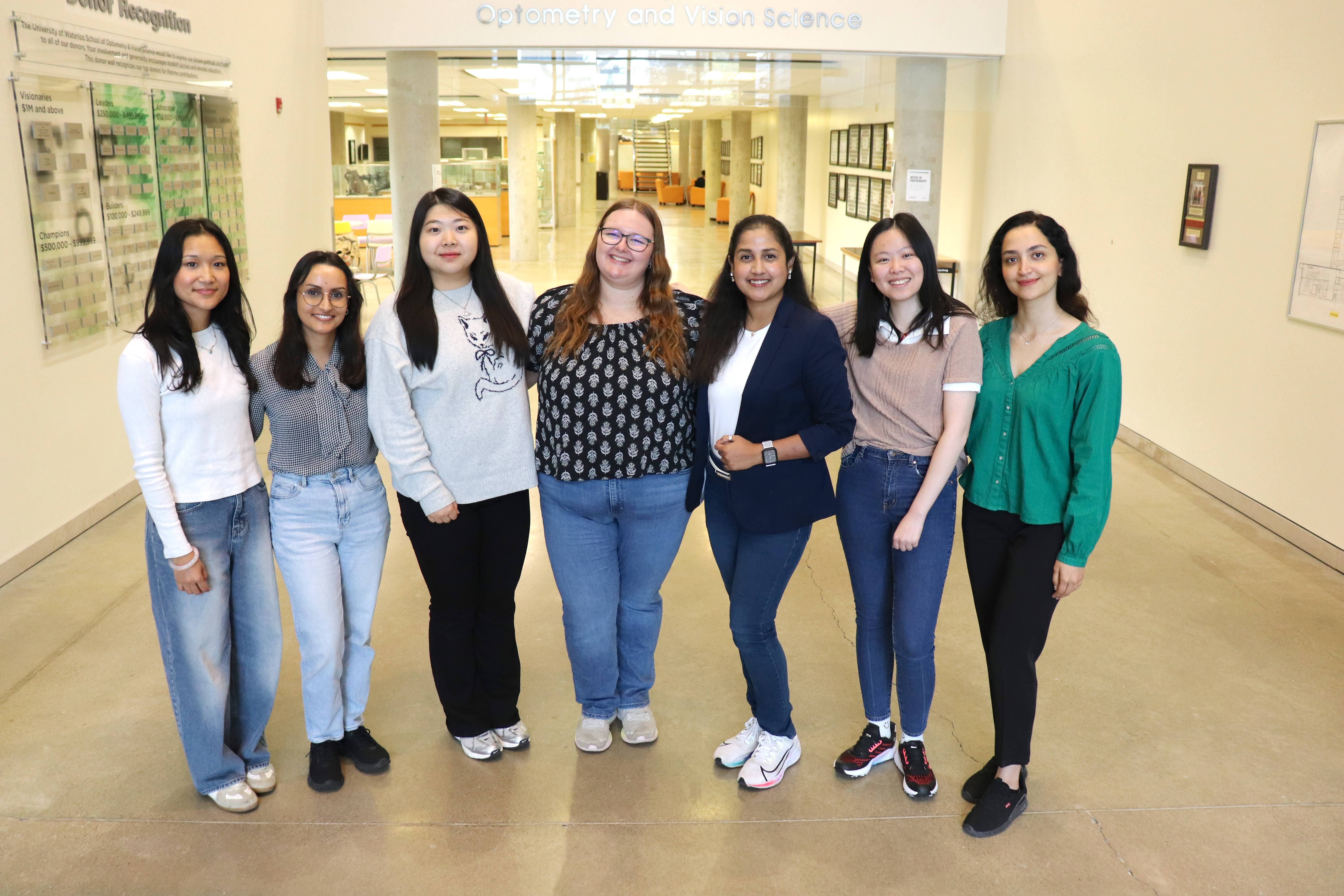 The GIVS executive team stand together for a photo