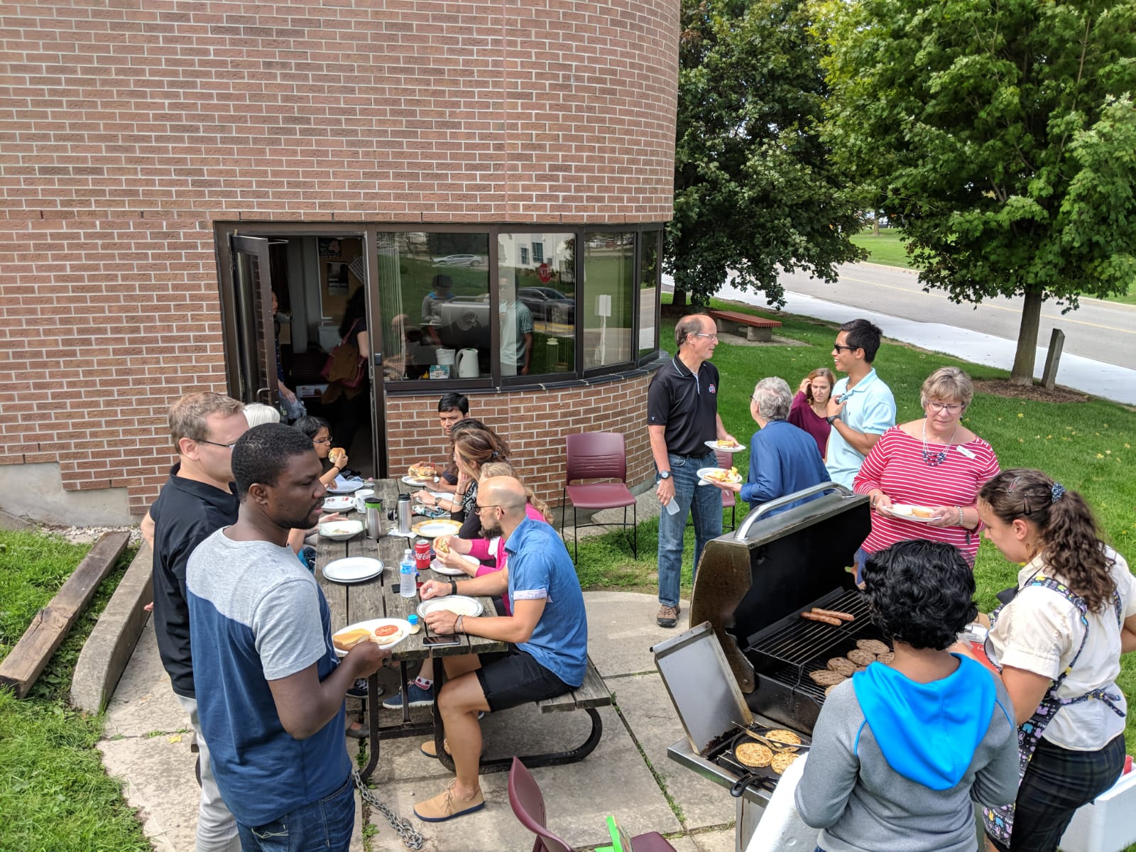 grad students and staff at a welcome bbq