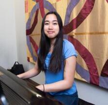 Jewel Reyes playing the piano