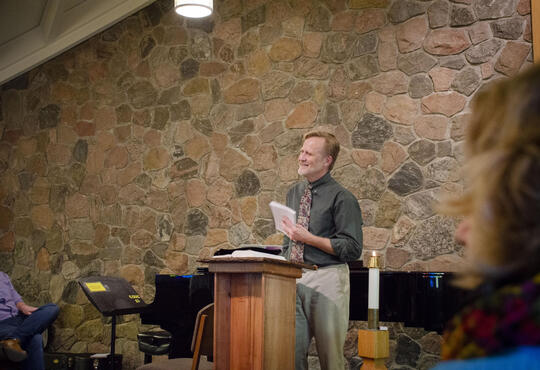 Ed Janzen preaches in the chapel